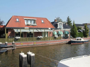 Attractive holiday home by the water